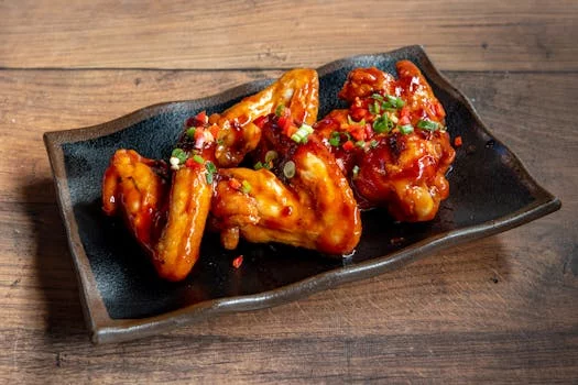 spicy fried chicken with hot sauce glaze